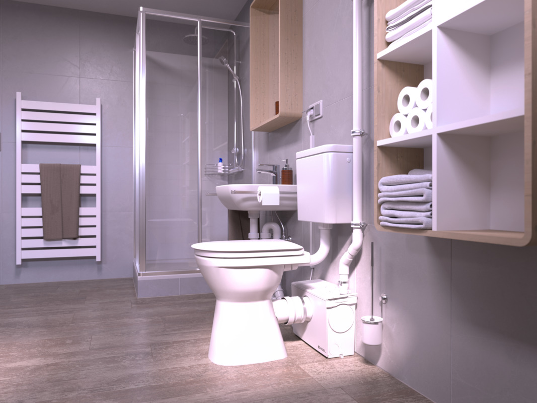 Zbliżenie na toaletę, za którą znajduje się Mała przepompownia wewnętrzna, do której podłączona jest również kabina prysznicowa.