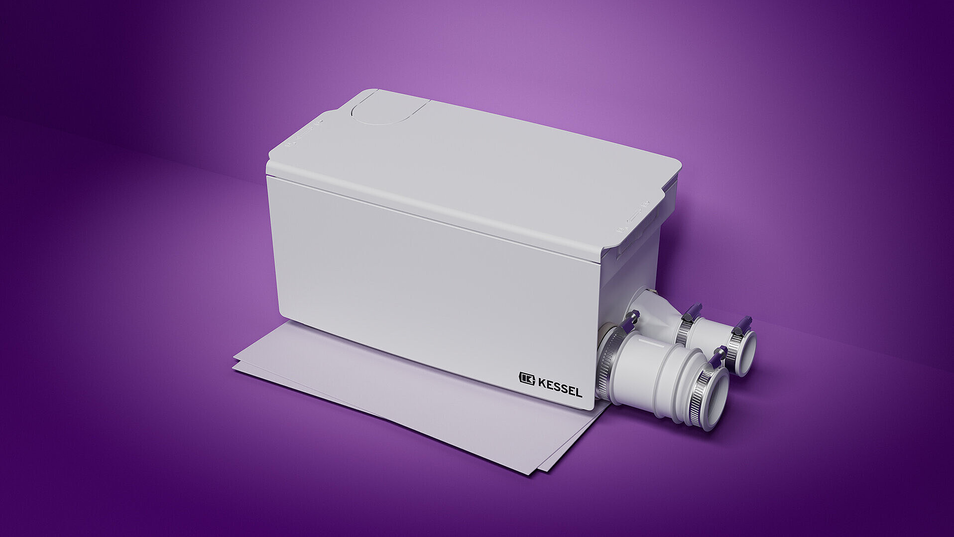 Przepompownia wewnętrzna Minilift umieszczono na kartce formatu A4, aby pokazać proporcje.